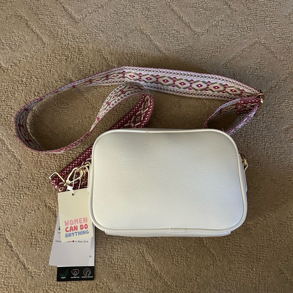 Elegant White Crossbody Bag with Patterned Strap